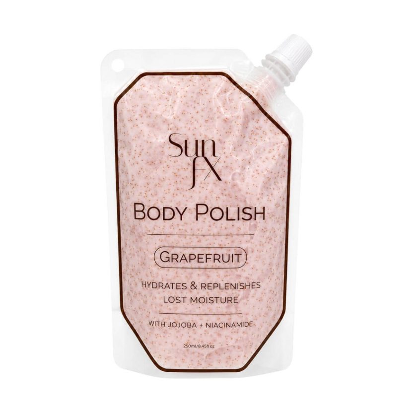 Sun FX Grapefruit Body Polish in a clear octagonal squeeze pouch with a white spout cap, showing the pinkish-cream polish inside, on a white background.