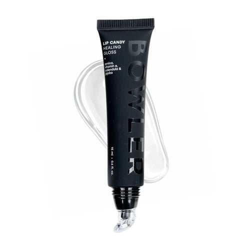 Bowker Black lip candy tube labeled Almond Cherry with applicator on a white background