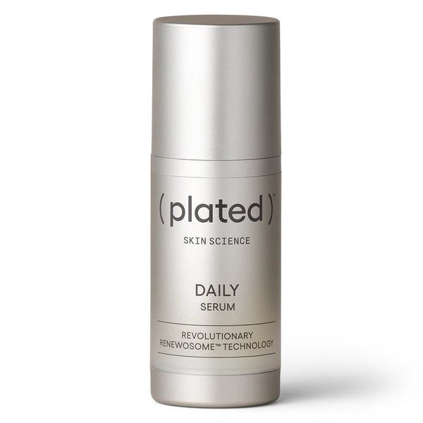 Silver skincare serum bottle labeled 'plated' on a white background